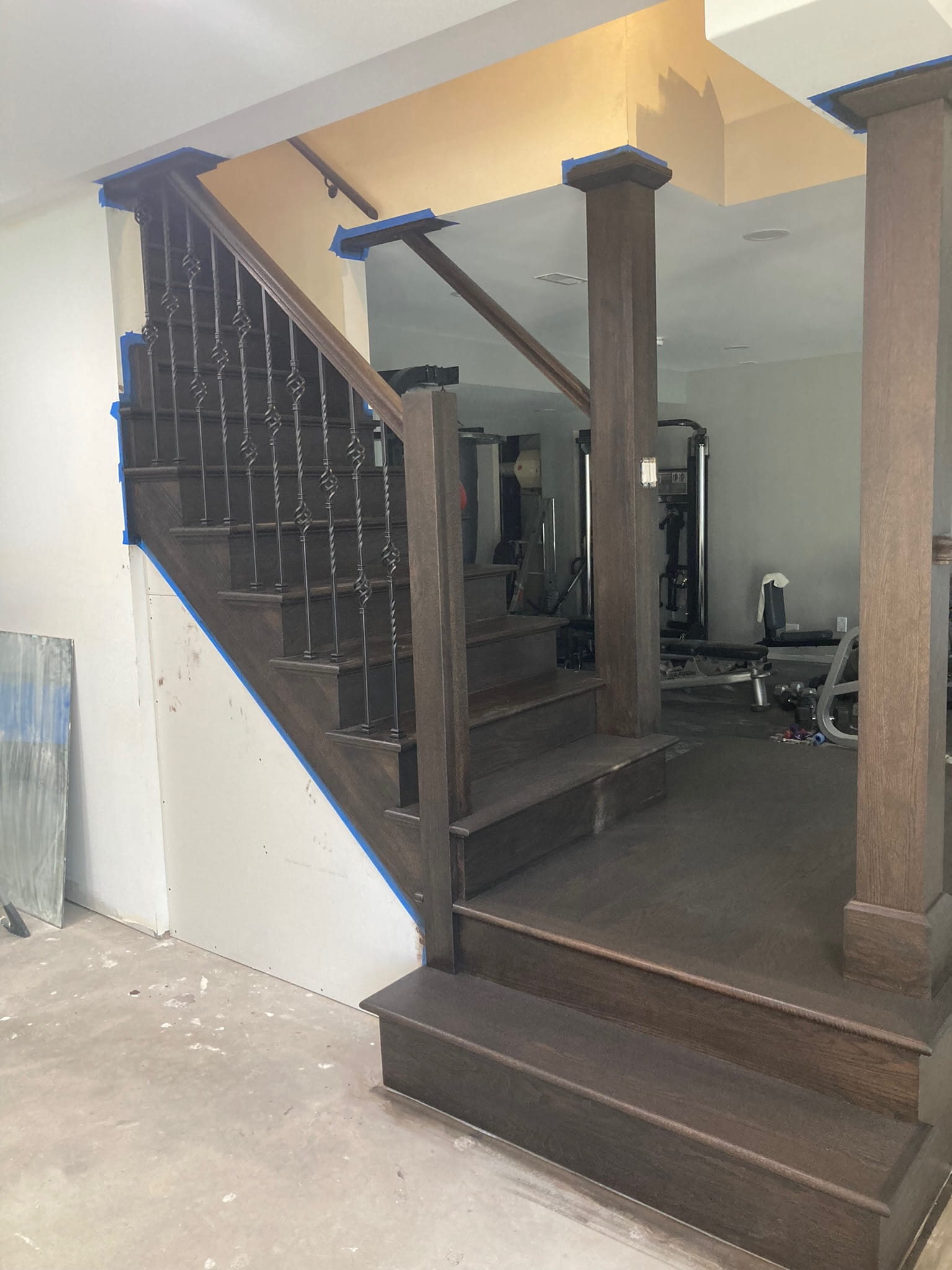 After: completed staircase and railing with finished treads