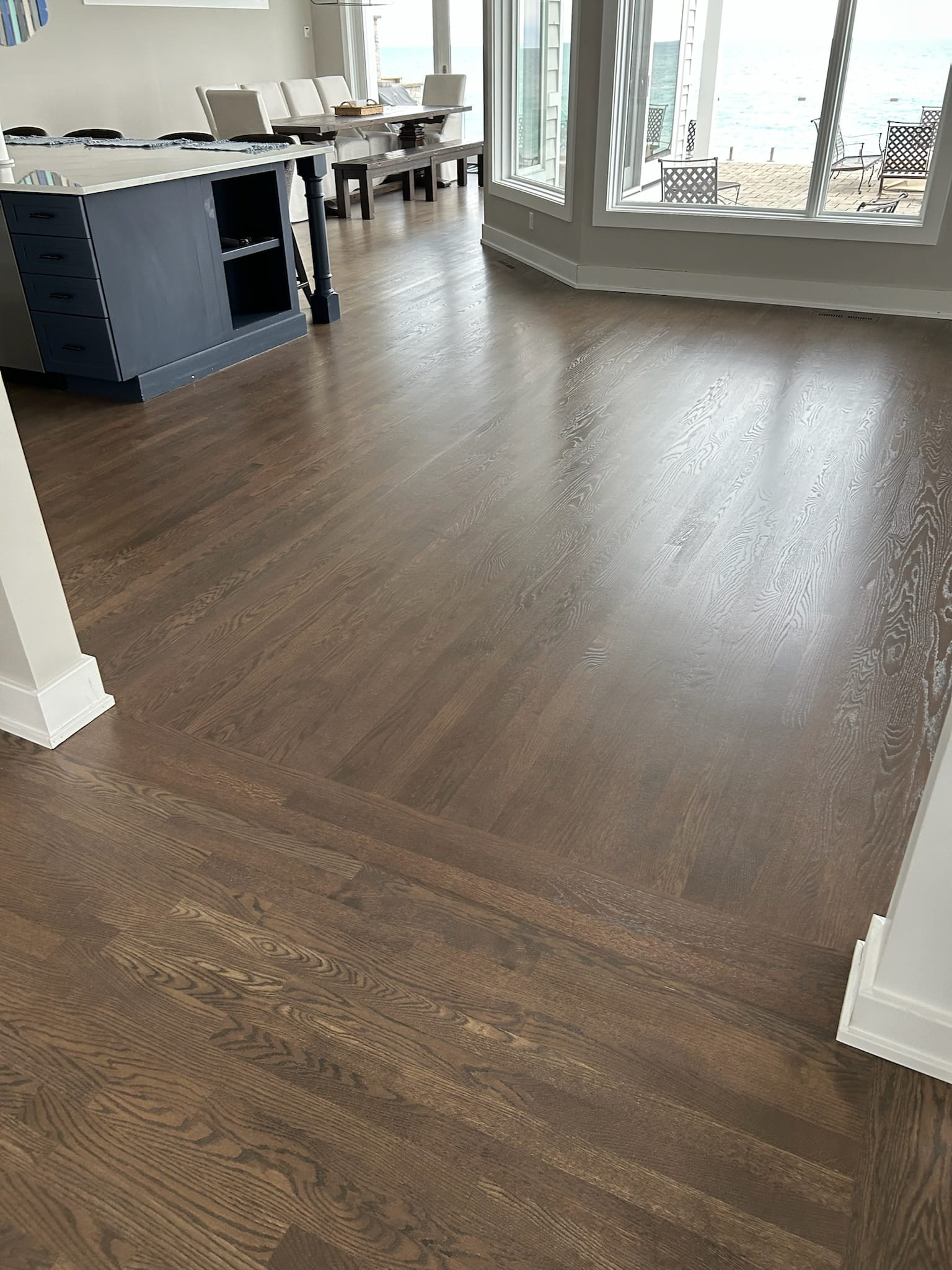 After: finished dark-stained hardwood floor